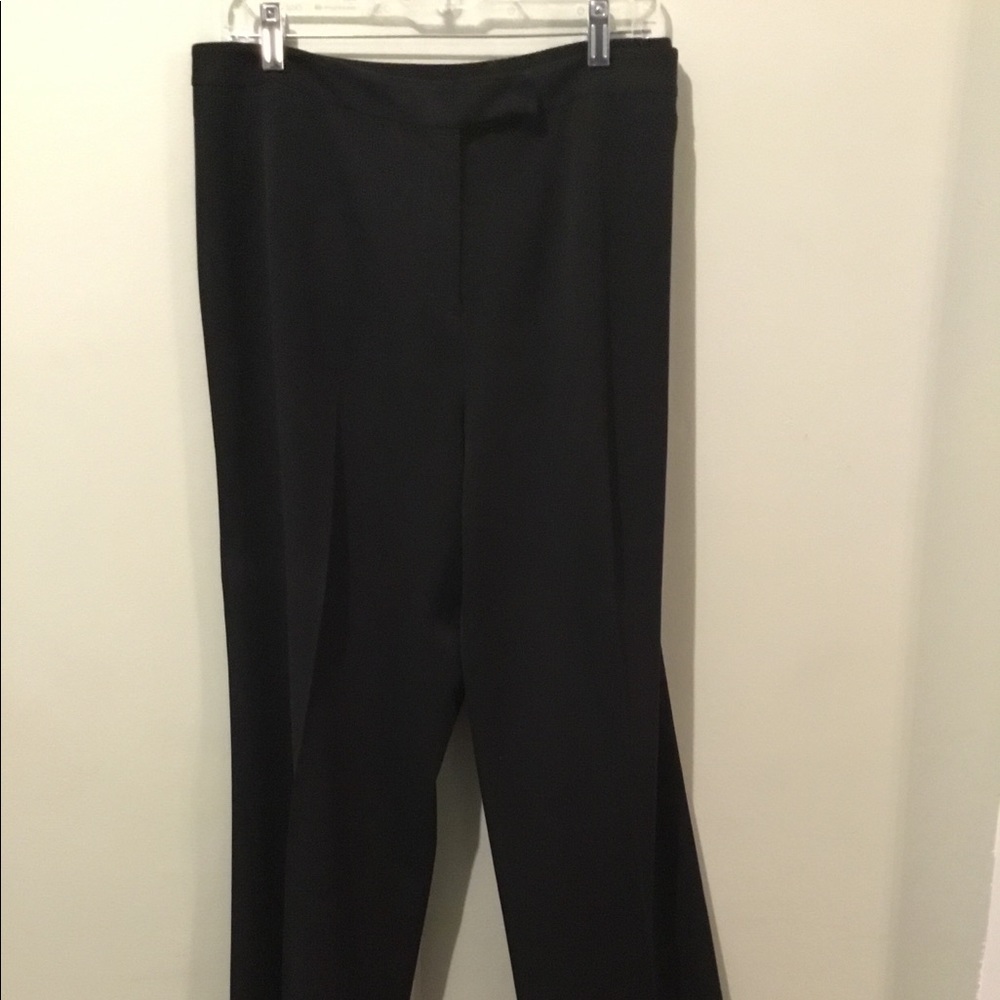 Women’s black dress pants.